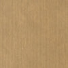 Détail texture vergée du papier kraft brun pour emballage cadeau en magasin