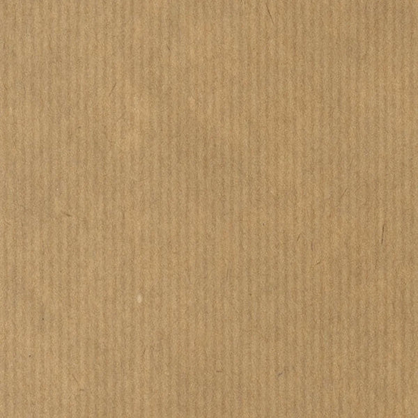 Détail texture vergée du papier kraft brun pour emballage cadeau en magasin