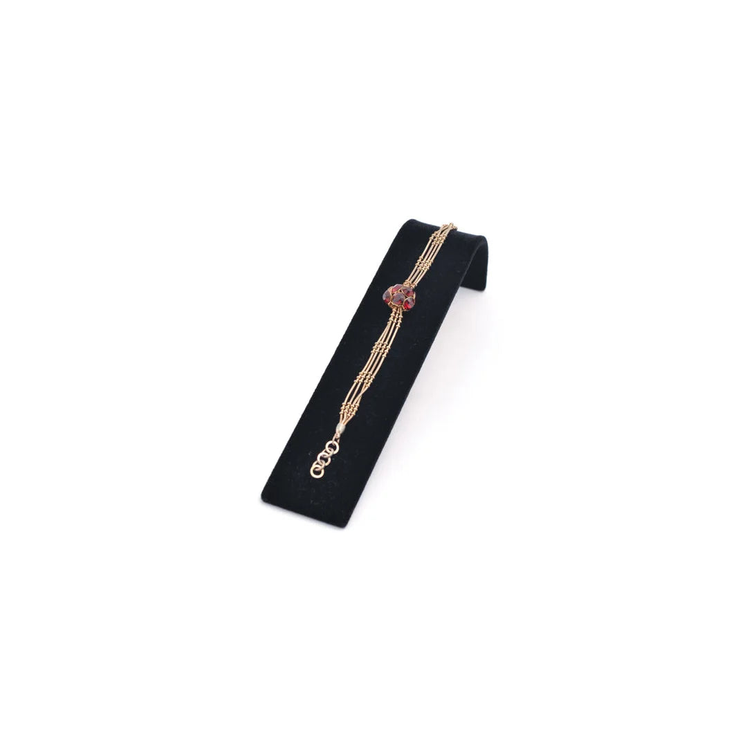 Présentoir professionnel en métal floqué velours noir pour bracelets et montres, vue de côté