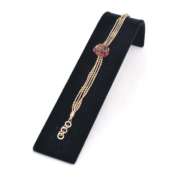 Présentoir professionnel en métal floqué velours noir pour bracelets et montres, vue de côté