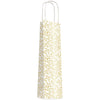 Détail poignées torsadées sac kraft luxe blanc décor végétal doré pour magasin