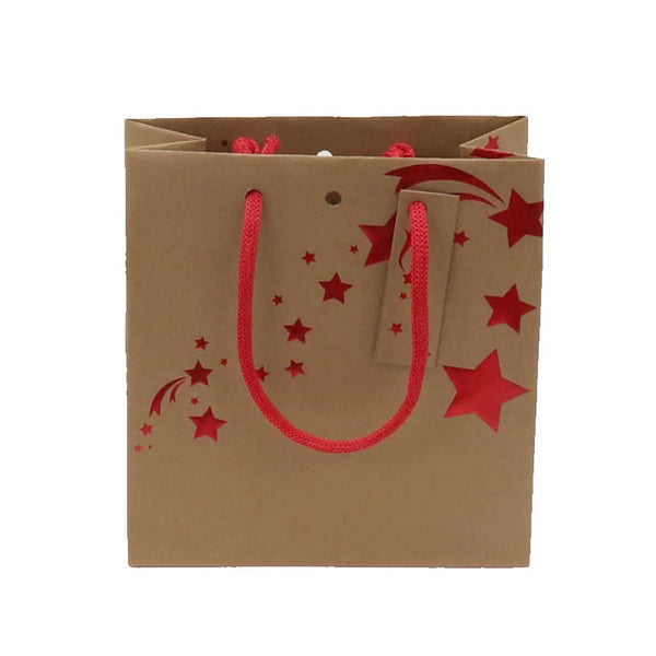 Sac en papier kraft Noël décor étoiles rouges brillantes, poignées tressées — boutique et épicerie fine