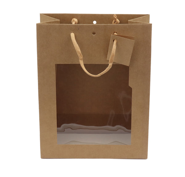 Sac vitrine vertical kraft brun avec fenêtre, 175 g/m², poignées cordelières et fond renforcé, carte cadeau incluse. Élégant et recyclable.