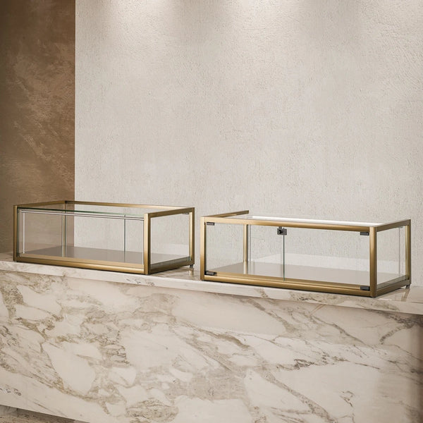 Vitrine comptoir d'exposition TM95TB finition bronze en verre sécurit avec structure métallique et portes coulissantes pour magasin, boutique et showroom.