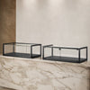 Vitrine comptoir d'exposition TM95TB noire en verre sécurit avec structure métallique et portes coulissantes pour magasin, boutique et showroom.