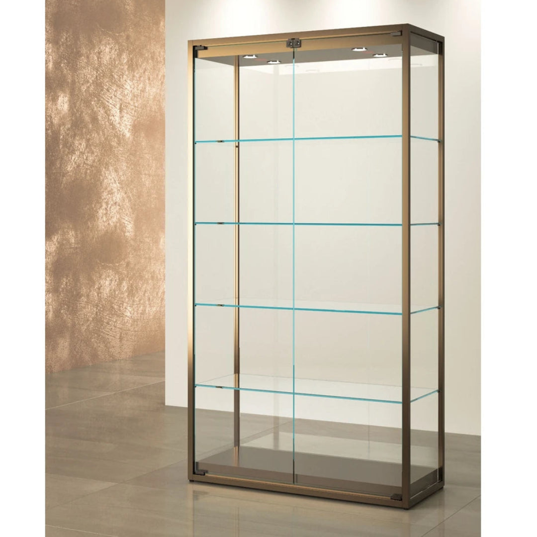 Vitrine colonne TM-95V bronze en verre avec structure métallique pour présentation de bijoux et objets précieux en magasin haut de gamme.