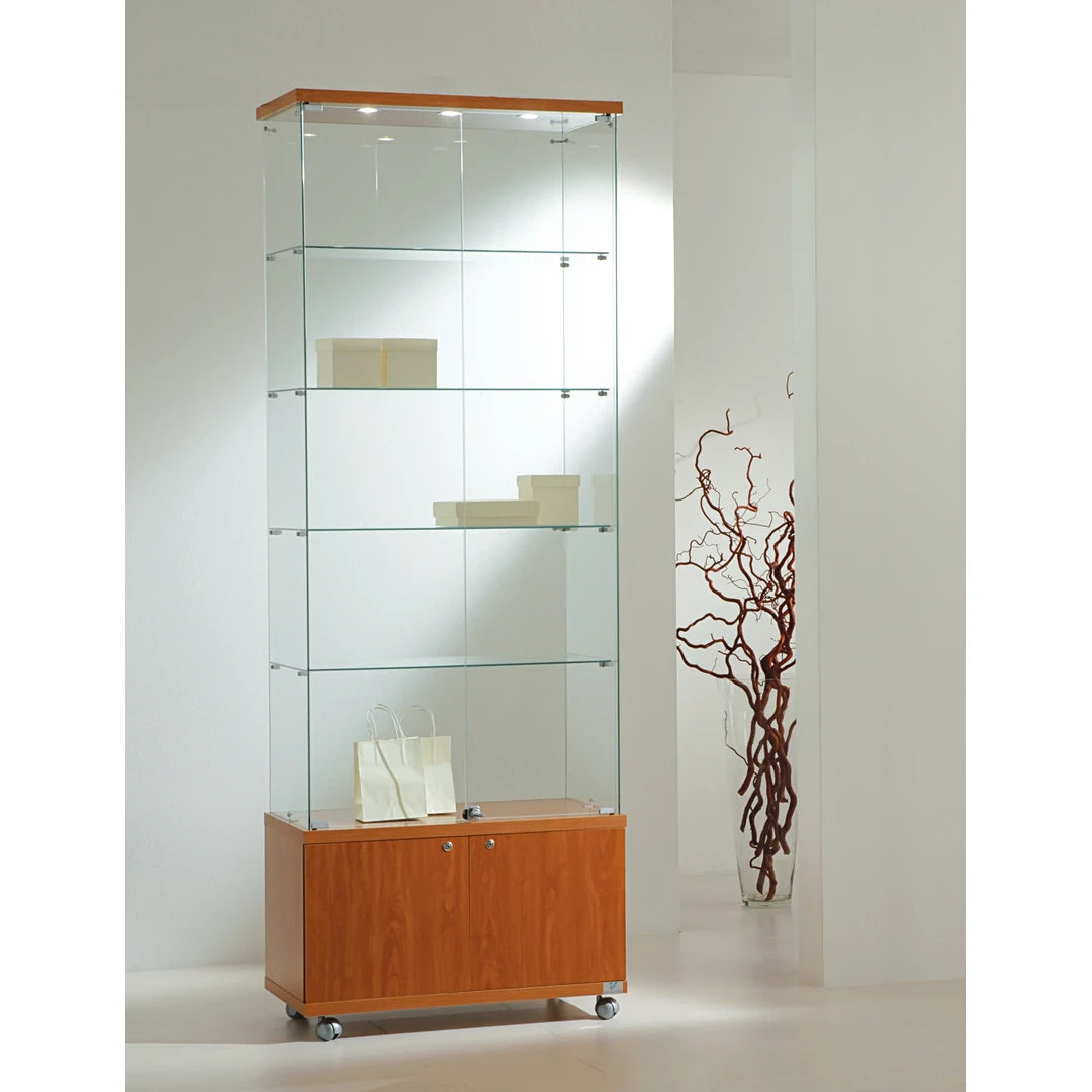 Abschliessbare Glasvitrine mit LED-Beleuchtung und Schlüsselbox auf Rollen für die Produktpräsentation und -lagerung im Ladengeschäft.