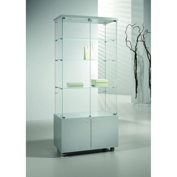 Vitrine en verre avec LED, 3 étagères et box de rangement sur roulettes pour exposition et stockage de produits en magasin.