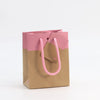 sac kraft naturel 175 g/m² avec impression rose de la collection L’Exceptionnel Line, élégant et robuste, idéal pour boutiques haut de gamme et cadeaux