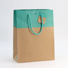 sac kraft naturel 175 g/m² avec impression turquoise de la collection L’Exceptionnel Line, élégant et robuste, idéal pour boutiques haut de gamme et cadeaux