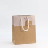 sac kraft naturel 175 g/m² avec impression blanche de la collection L’Exceptionnel Line, élégant et robuste, idéal pour boutiques haut de gamme et cadeaux