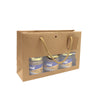 confiturier vitrine horizontal kraft brun avec fenêtre, 175 g/m², poignées cordelières et fond renforcé, carte cadeau incluse. Élégant et recyclable.